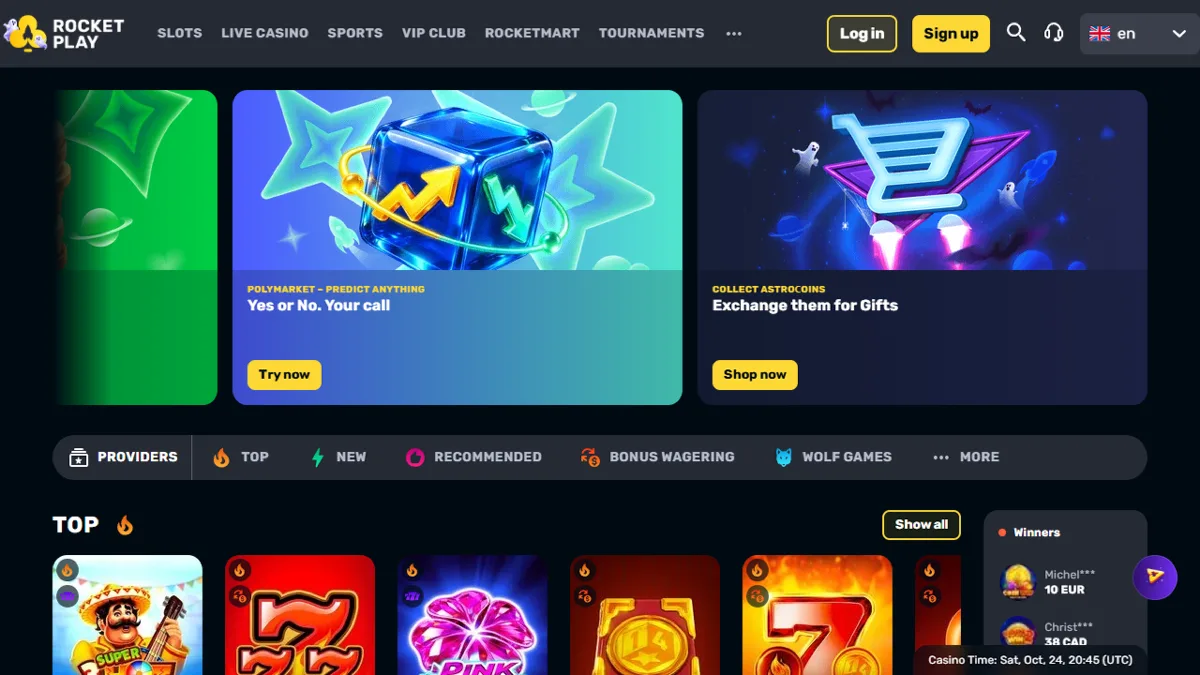 RocketPlay Casino lobby with Polymarket and AstroCoins banners and the Top games row